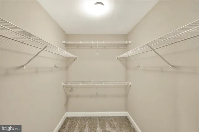 a view of a room with racks on the wall