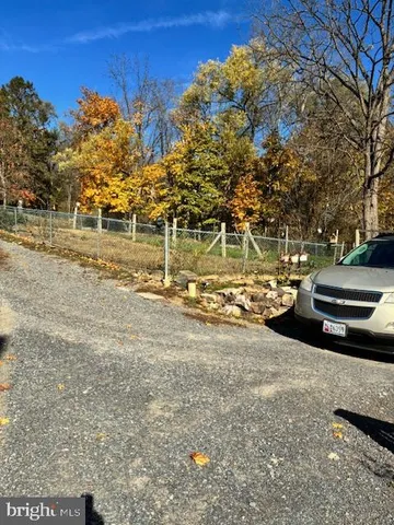 a view of a street with some trees