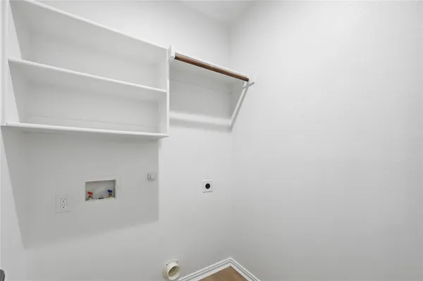 a view of small space with racks on the wall