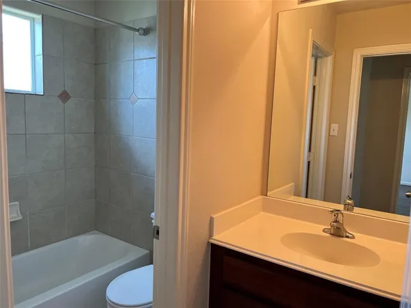 a view of a backyard of the house