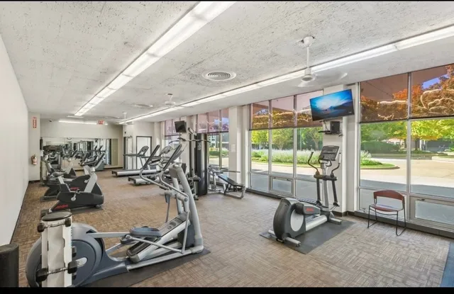 a view of a room with gym equipment