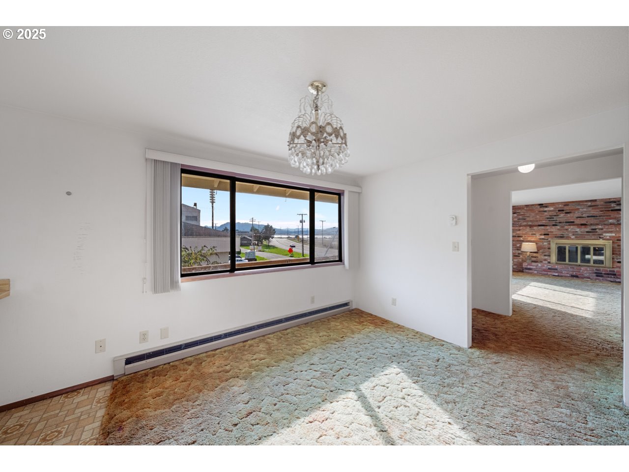 205 Marsh Street Gardiner, OR 97441 - Photo 23 of 46 a view of livingroom with window