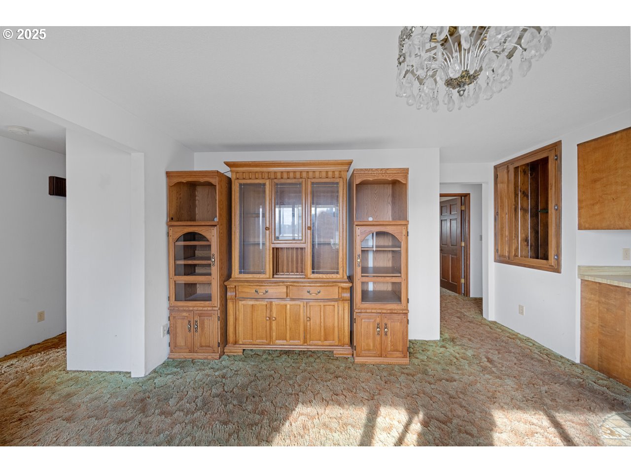 205 Marsh Street Gardiner, OR 97441 - Photo 25 of 46 a view of empty room with kitchen