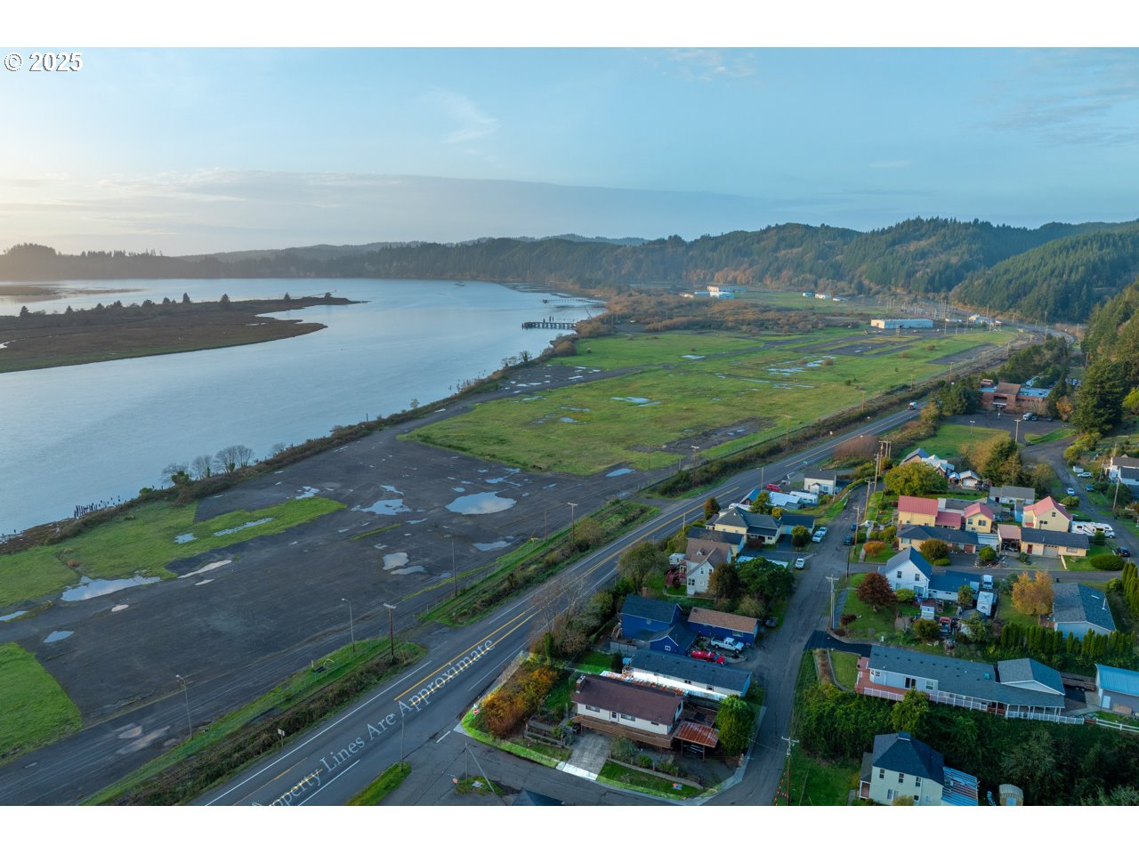 205 Marsh Street Gardiner, OR 97441 - Photo 5 of 46 a view of a city with an ocean