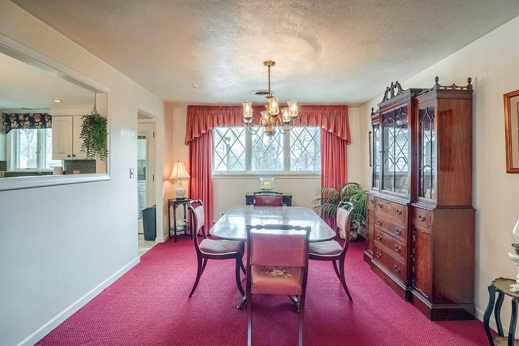 10 Sullivan Drive Randolph, MA 02368 - Photo 12 of 40 a dining room with furniture and window