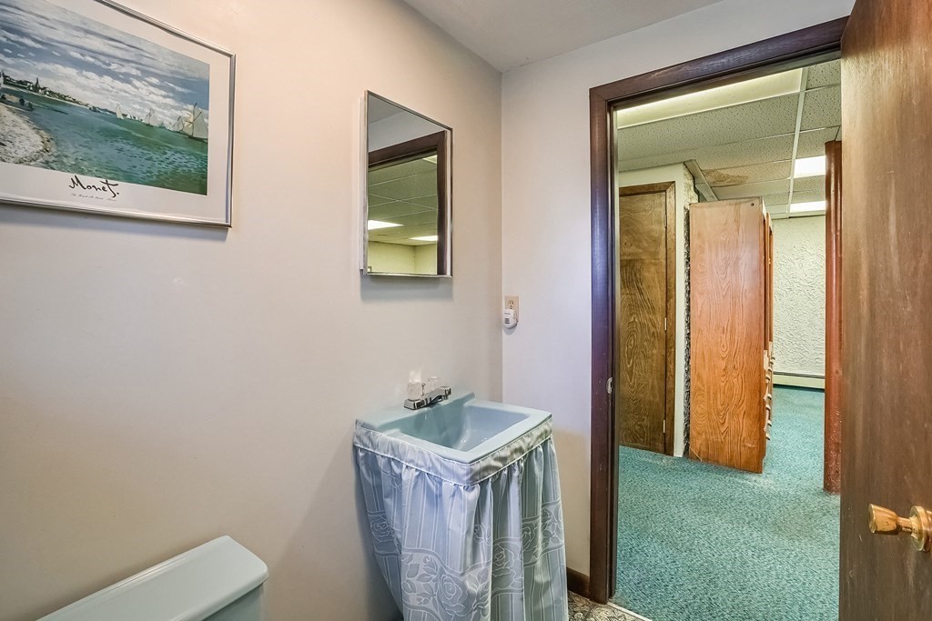 10 Sullivan Drive Randolph, MA 02368 - Photo 26 of 40 a bathroom with a toilet