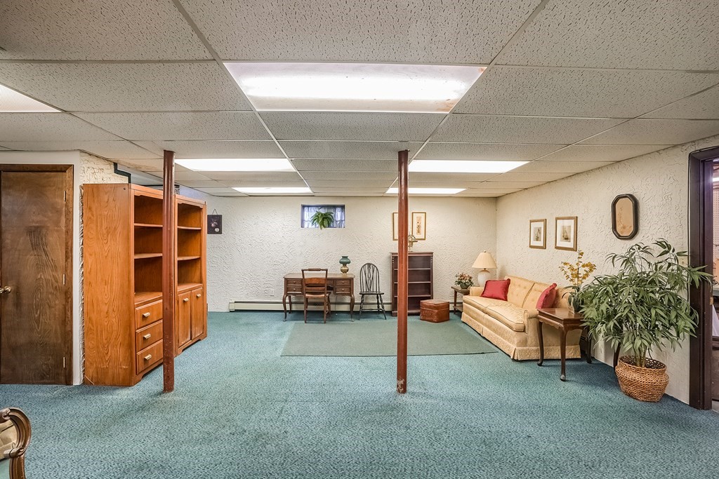 10 Sullivan Drive Randolph, MA 02368 - Photo 29 of 40 a living room with furniture