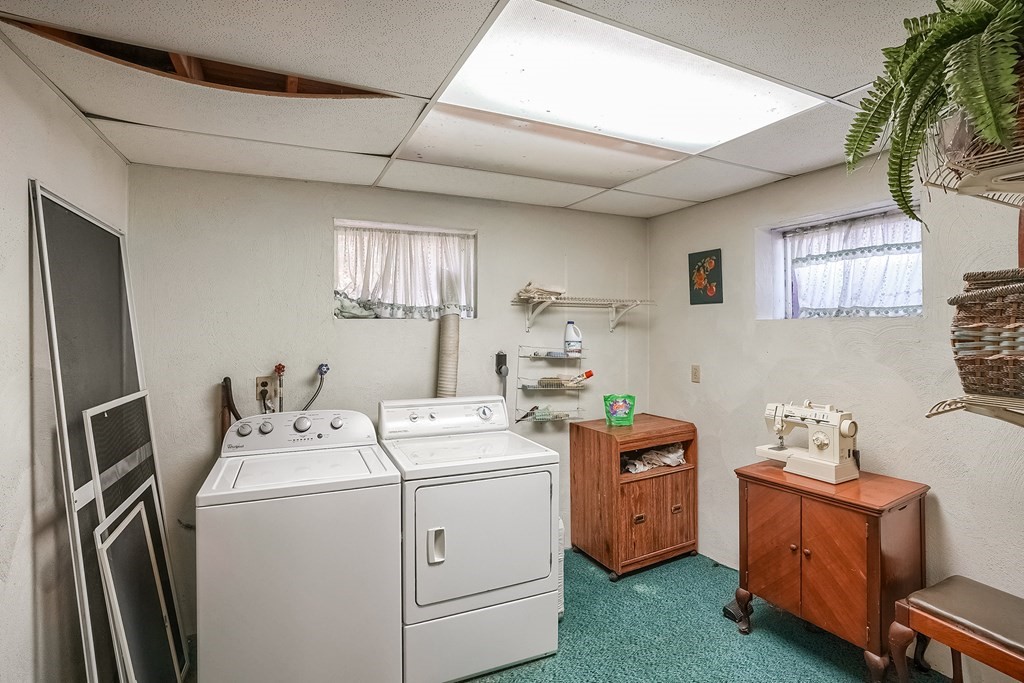 10 Sullivan Drive Randolph, MA 02368 - Photo 31 of 40 a utility room with dryer and washer