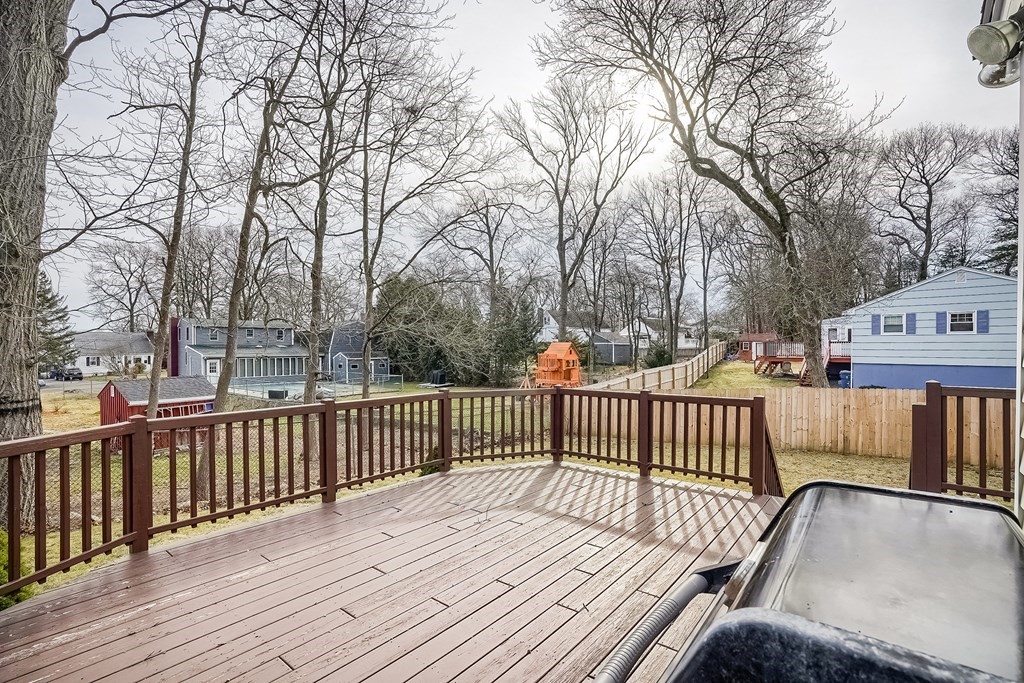 10 Sullivan Drive Randolph, MA 02368 - Photo 38 of 40 a view of balcony with wooden floor and fence