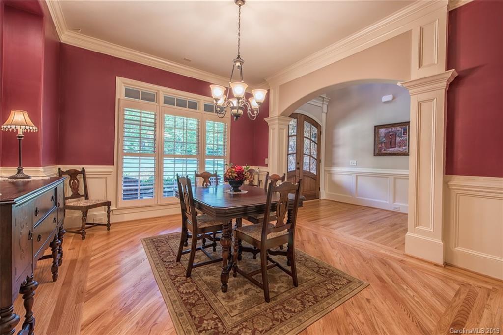 5809 Morning Star Road Lake Wylie, SC 29710 - Photo 22 of 42 a view of a dining room with furniture and chandelier