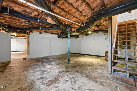 a view of a room with wooden walls