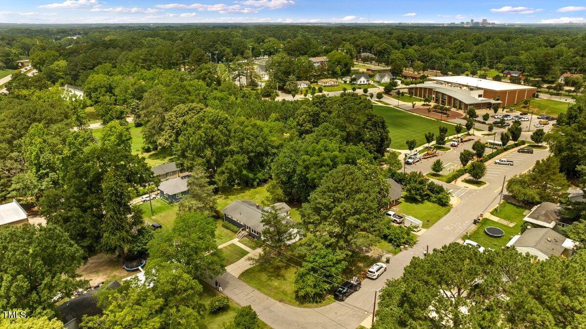 202 Purvis Street Garner, NC 27529 - Photo 24 of 28 a view of a garden with an outdoor space