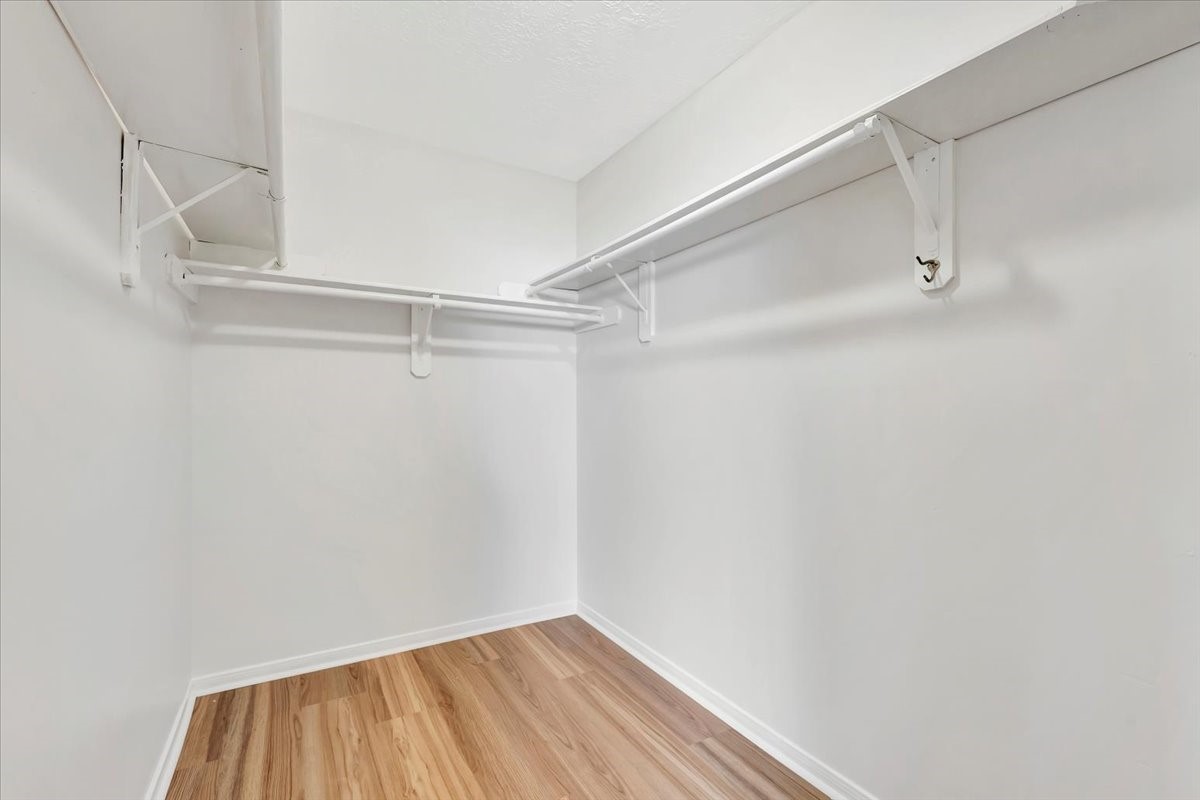 15131 Cranbourne Drive Houston, TX 77062 - Photo 22 of 42 a view of a room with racks on the wall