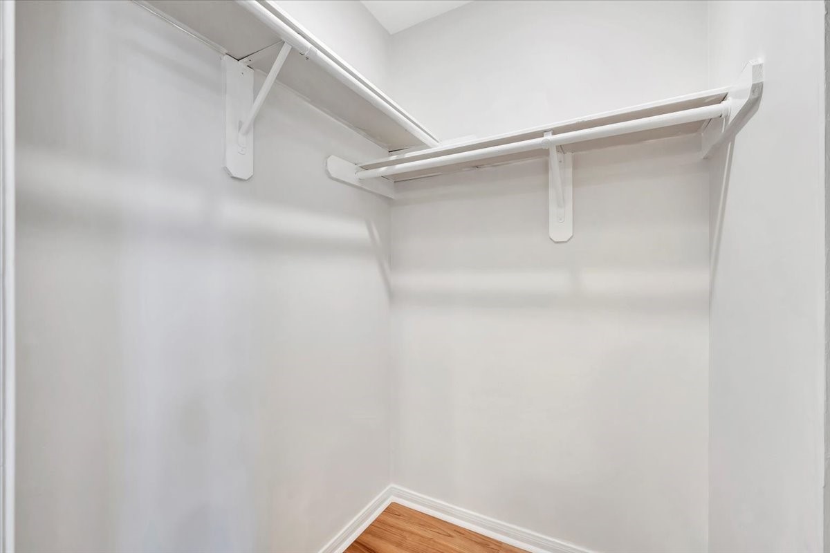 15131 Cranbourne Drive Houston, TX 77062 - Photo 28 of 42 a view of a room with racks on the wall