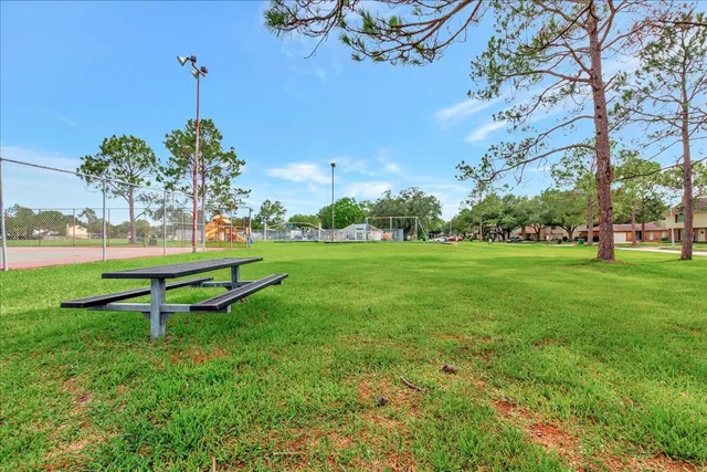 a view of a golf course with a lake
