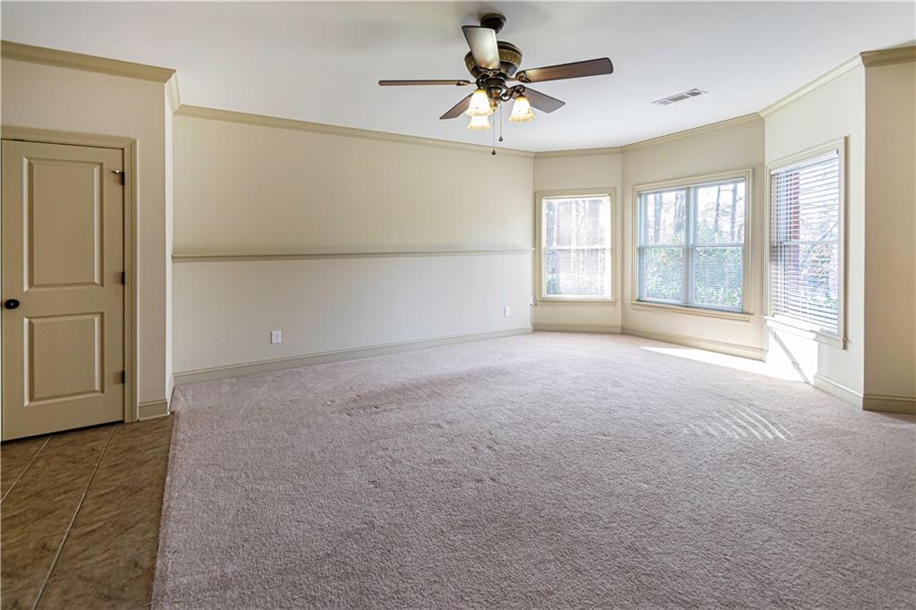 2050 Oak Grove Road Northeast Atlanta, GA 30345 - Photo 5 of 12 a view of an empty room with a window