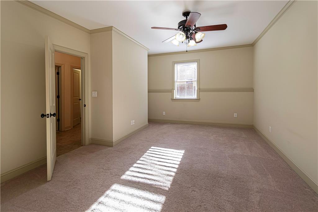 2050 Oak Grove Road Northeast Atlanta, GA 30345 - Photo 6 of 12 a view of an empty room with a window