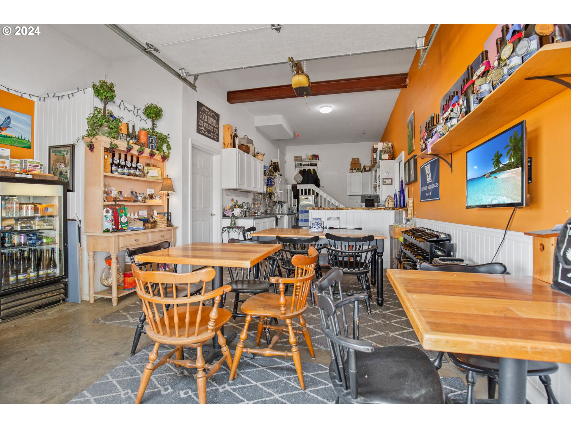 25059 Larson Road Monroe, OR 97456 - Photo 28 of 38 a dining area with furniture and a flat screen tv
