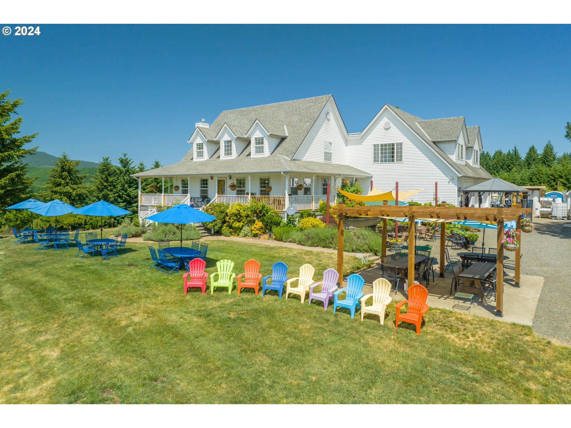 25059 Larson Road Monroe, OR 97456 - Photo 5 of 38 a front view of house with outdoor space and seating