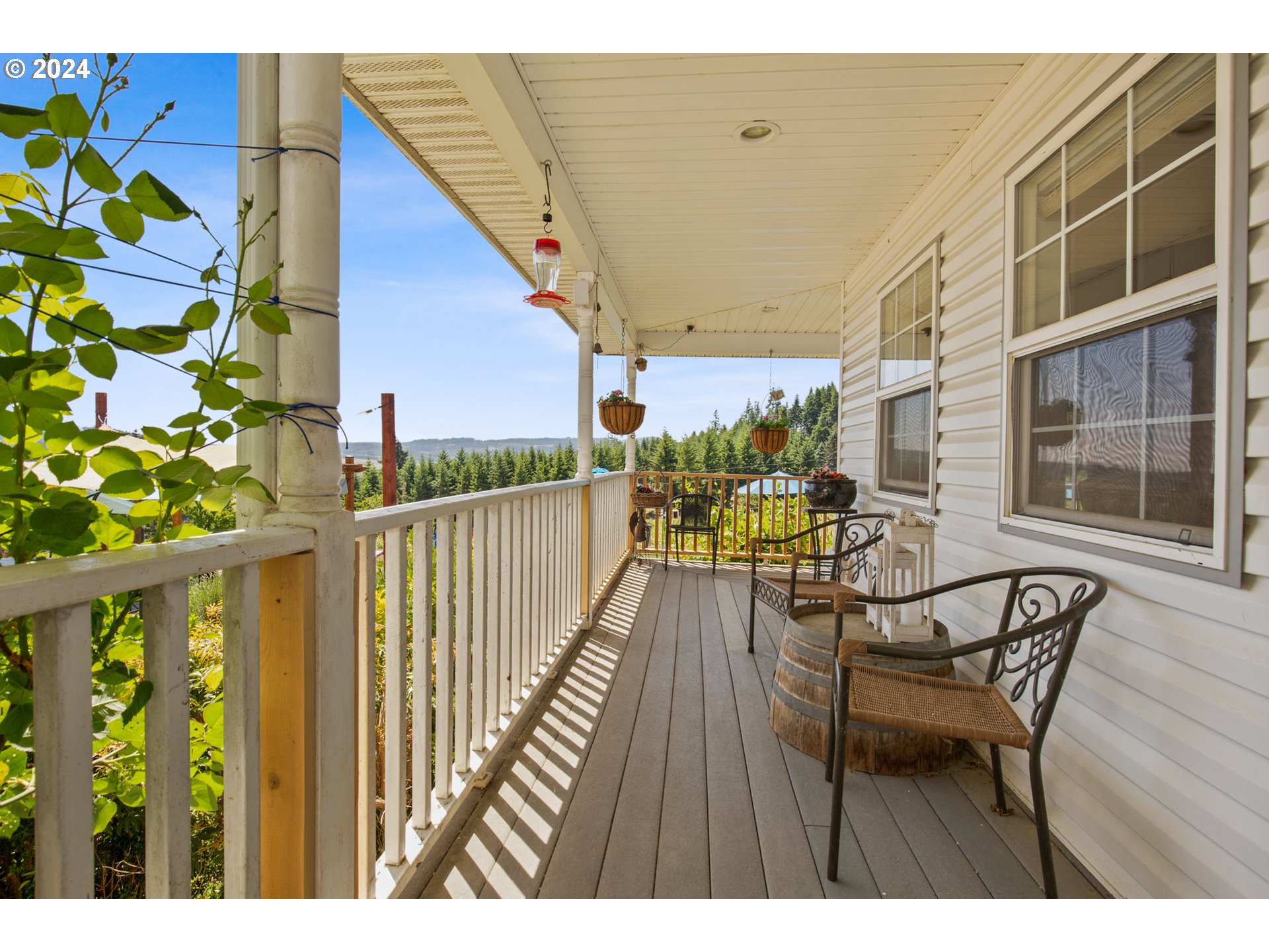 25059 Larson Road Monroe, OR 97456 - Photo 7 of 38 a view of a chairs and table in the balcony