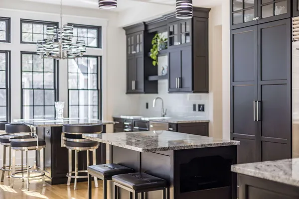 a view of a dining room with furniture wooden floor and chandelier