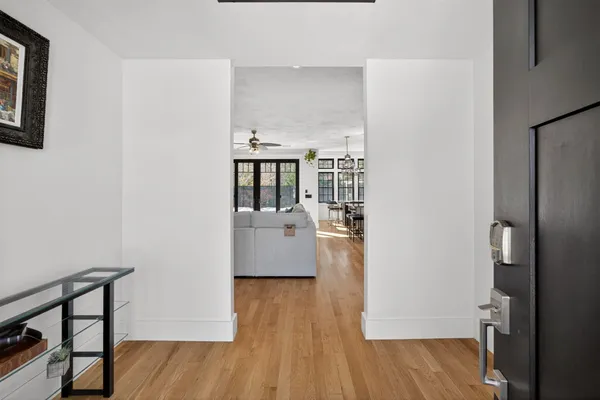 a view of kitchen and dining room with wooden floor