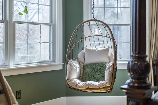 a bathroom with a bathtub and a shower curtain