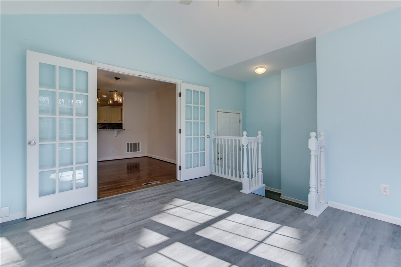 5205 Fieldstone Drive Raleigh, NC 27609 - Photo 6 of 13 The sunroom is heated/cooled and used year-round. Sun Room