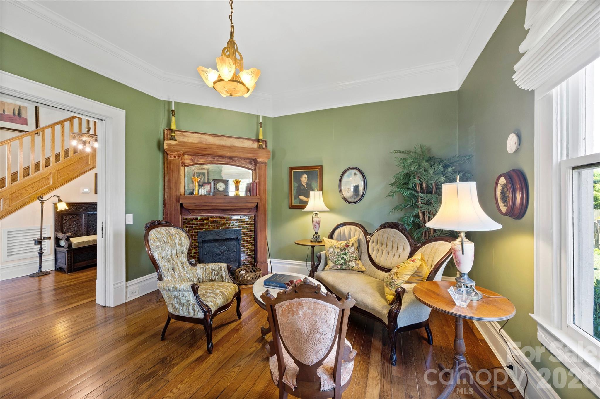 207 West Academy Street Cherryville, NC 28021 - Photo 11 of 45 a view of a dining room with furniture and wooden floor