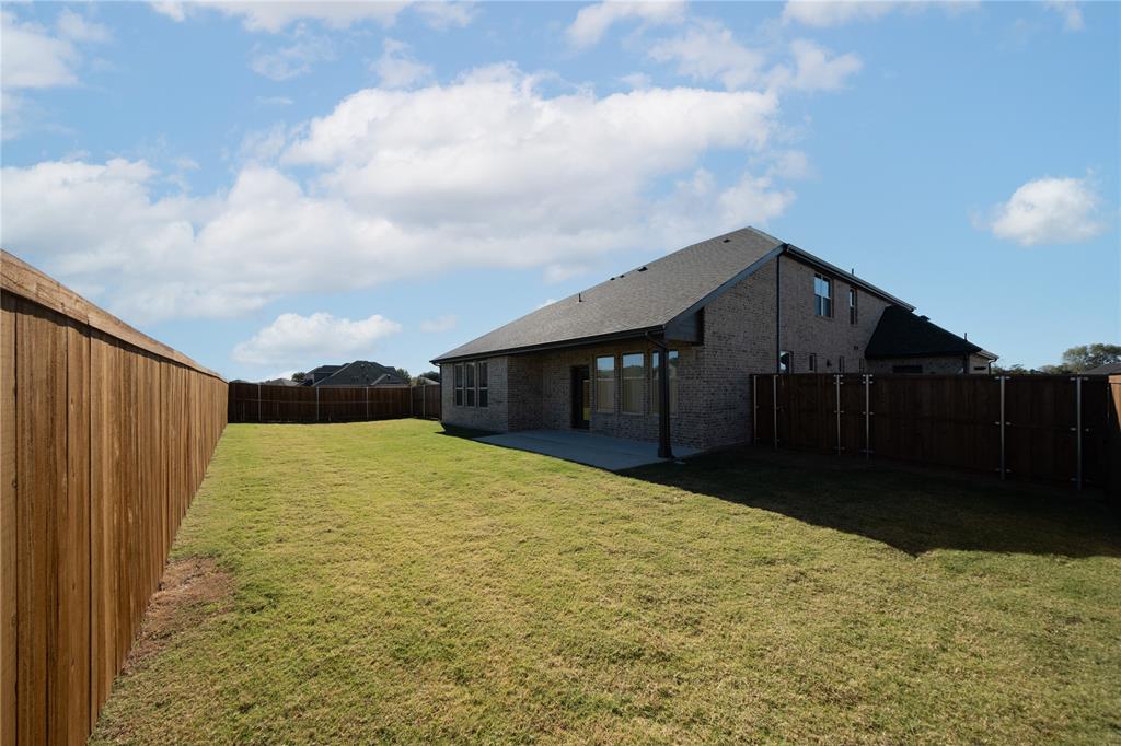 107 National Court Forney, TX 75126 - Photo 2 of 30 Backyard