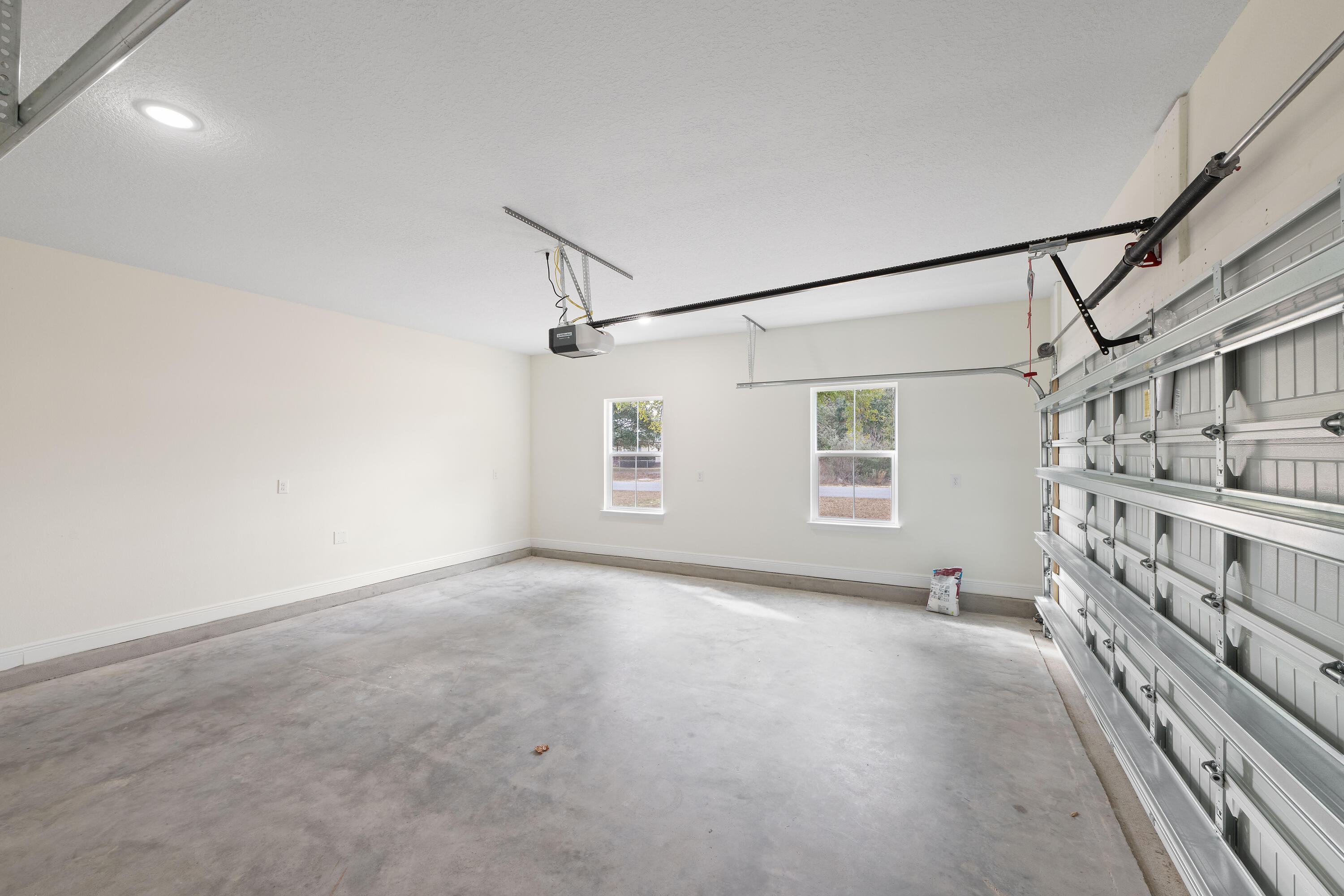 8370 Sevilla Street Navarre, FL 32566 - Photo 12 of 12 a view of a garage