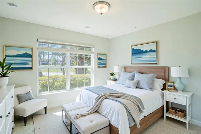 a bedroom with a bed and a couch