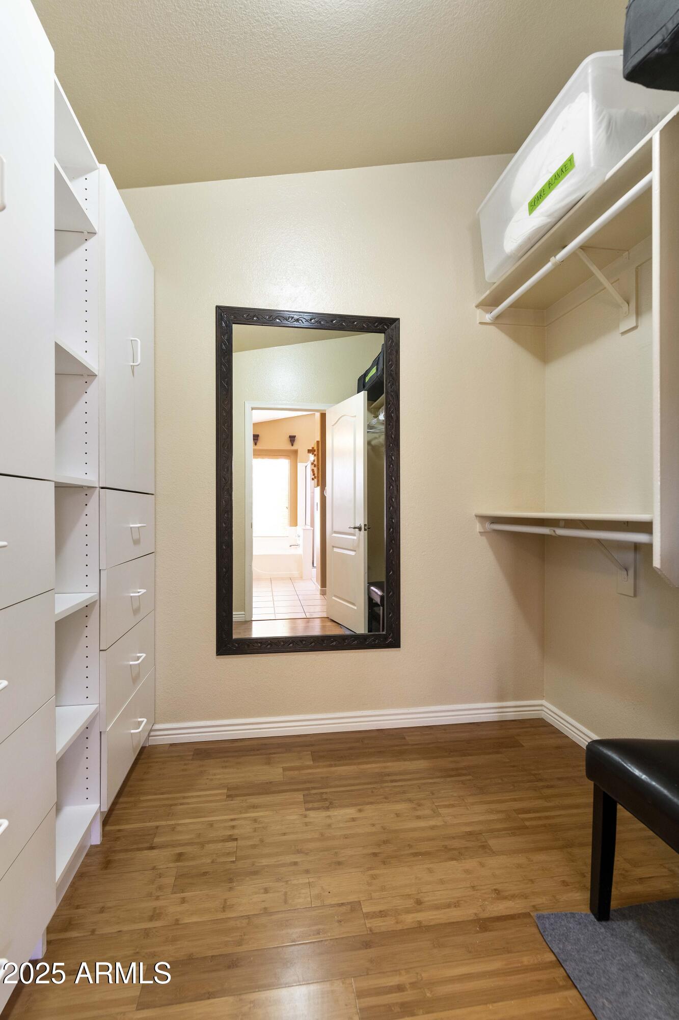 519 East Devon Drive Gilbert, AZ 85296 - Photo 2 of 47 a view of an empty room with cabinet and a window
