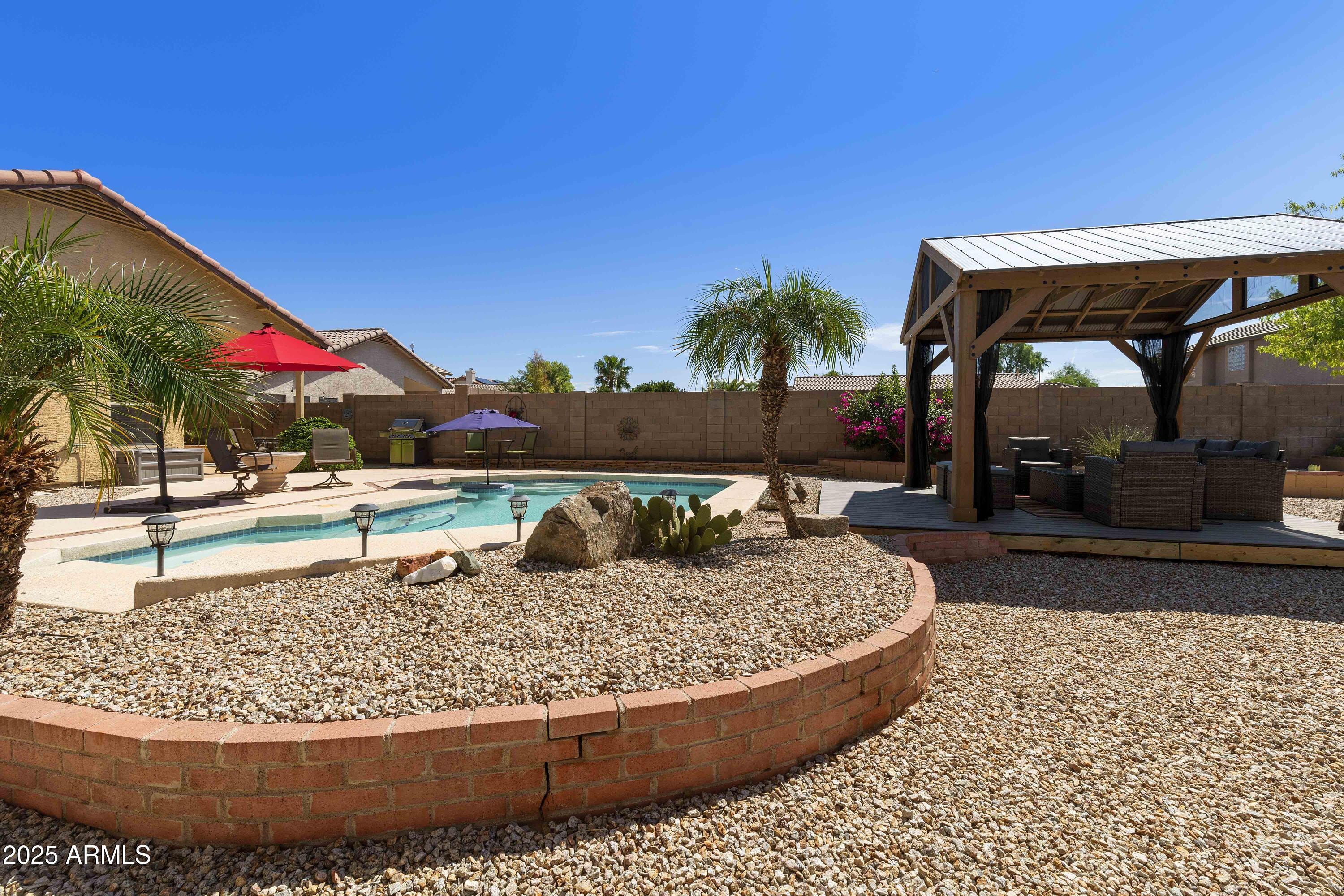 519 East Devon Drive Gilbert, AZ 85296 - Photo 25 of 47 a view of a backyard