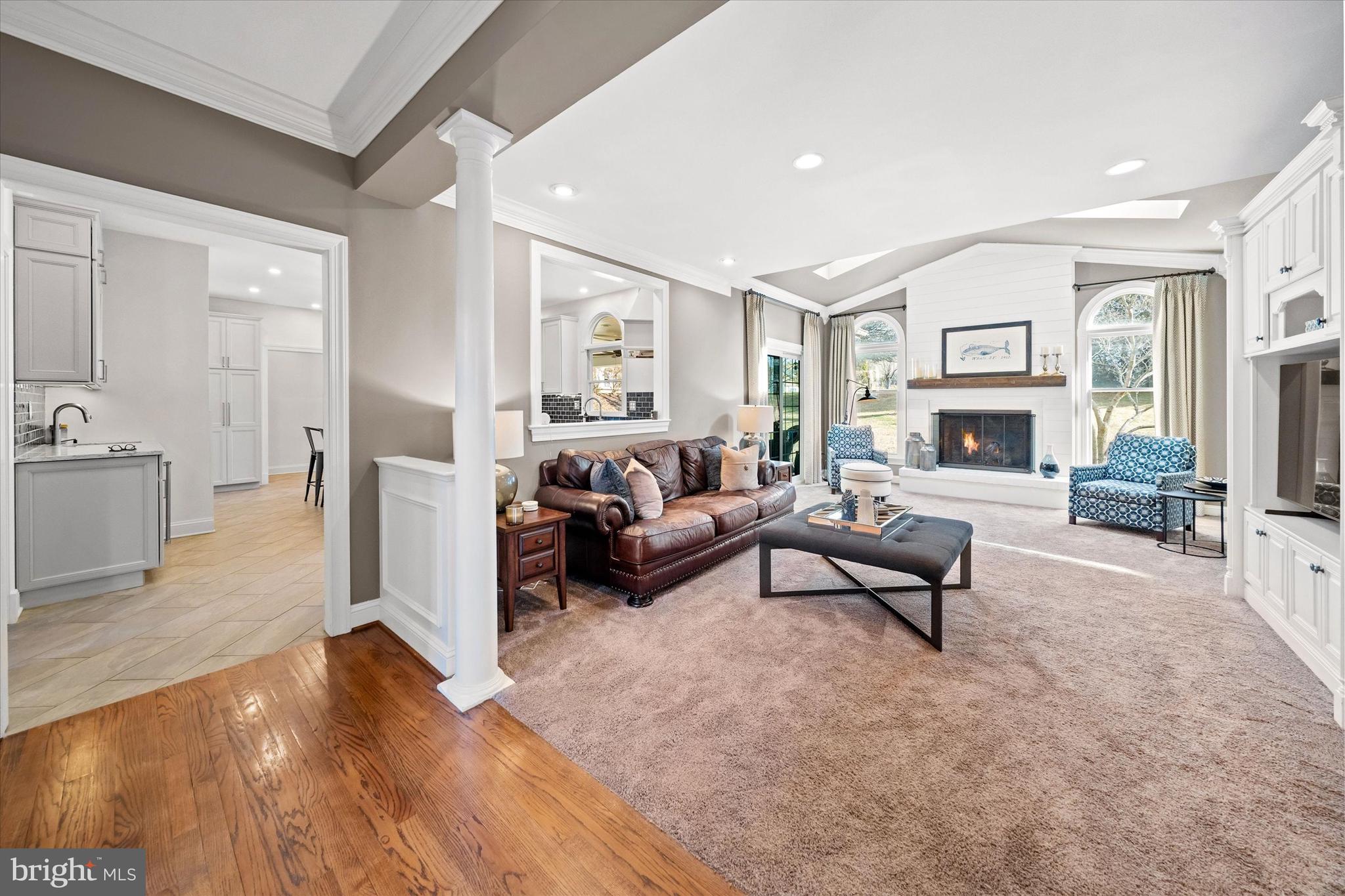 716 Regency Hill Road Hockessin, DE 19707 - Photo 15 of 73 a living room with furniture and a fireplace