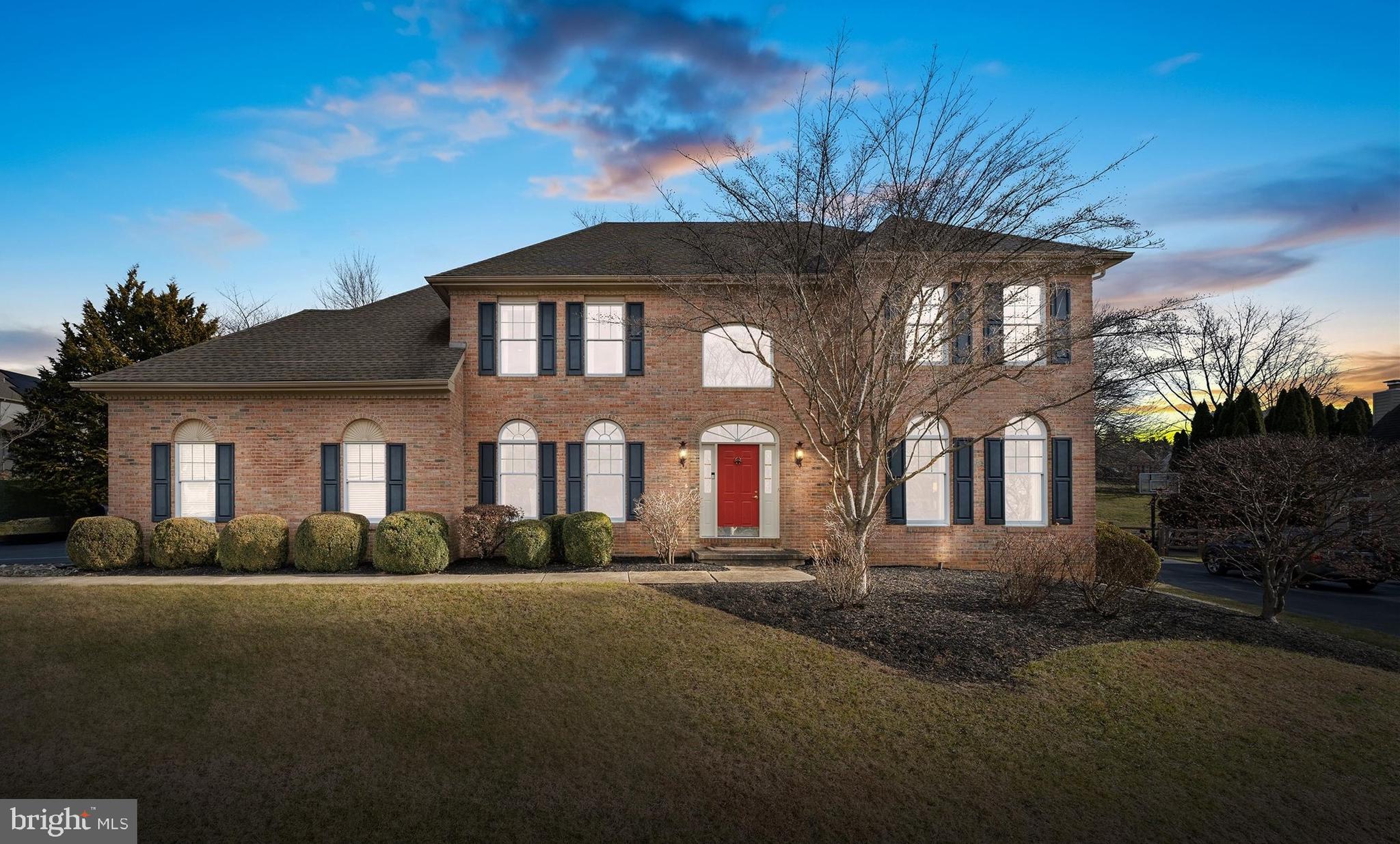 716 Regency Hill Road Hockessin, DE 19707 - Photo 2 of 73 a front view of a house with a yard