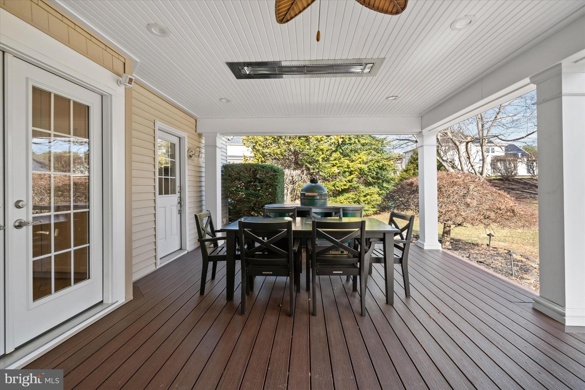 716 Regency Hill Road Hockessin, DE 19707 - Photo 36 of 73 a view of a dining room with furniture window and wooden floor