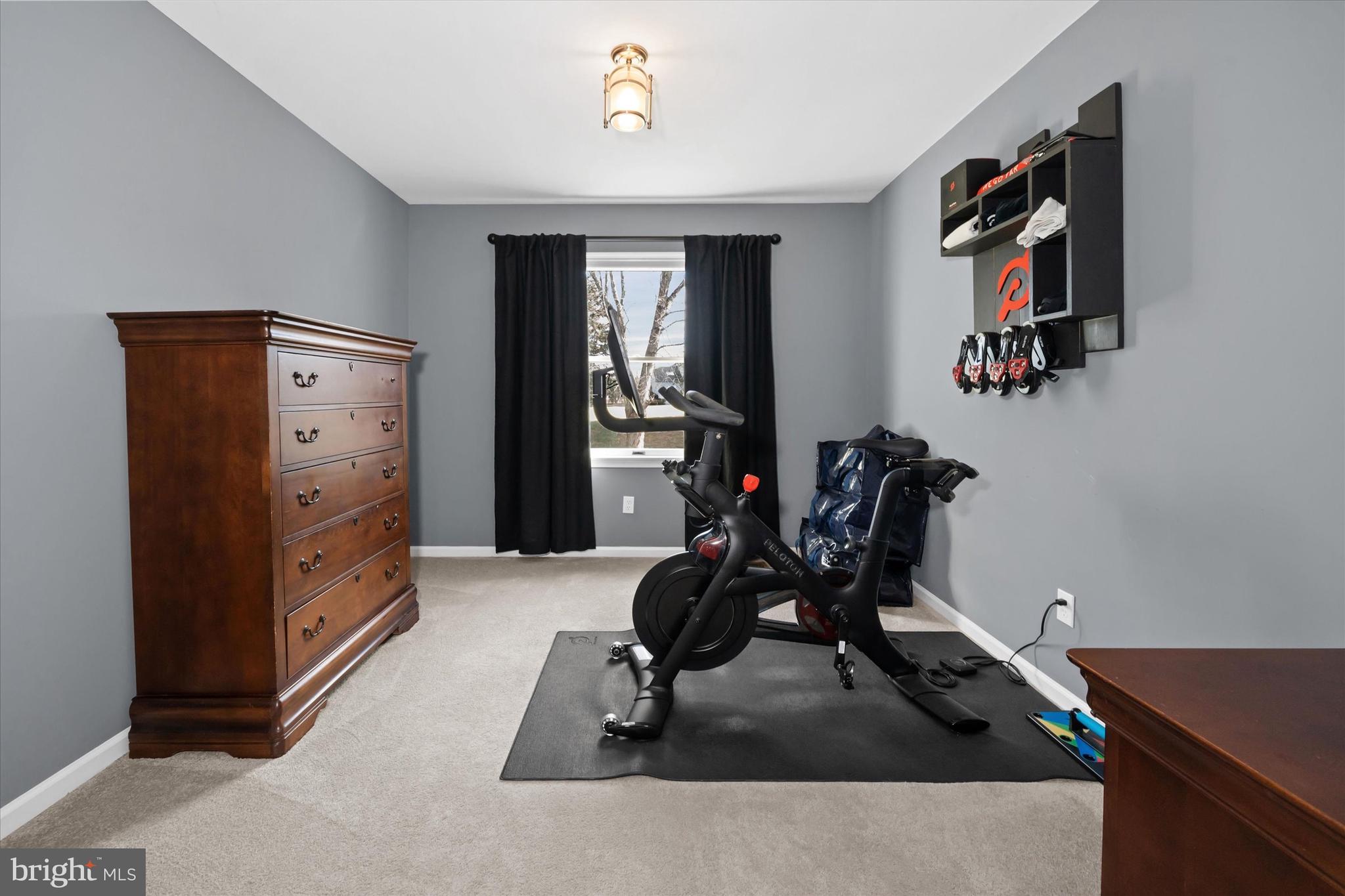 716 Regency Hill Road Hockessin, DE 19707 - Photo 42 of 73 a view of a workspace with furniture and gym equipment