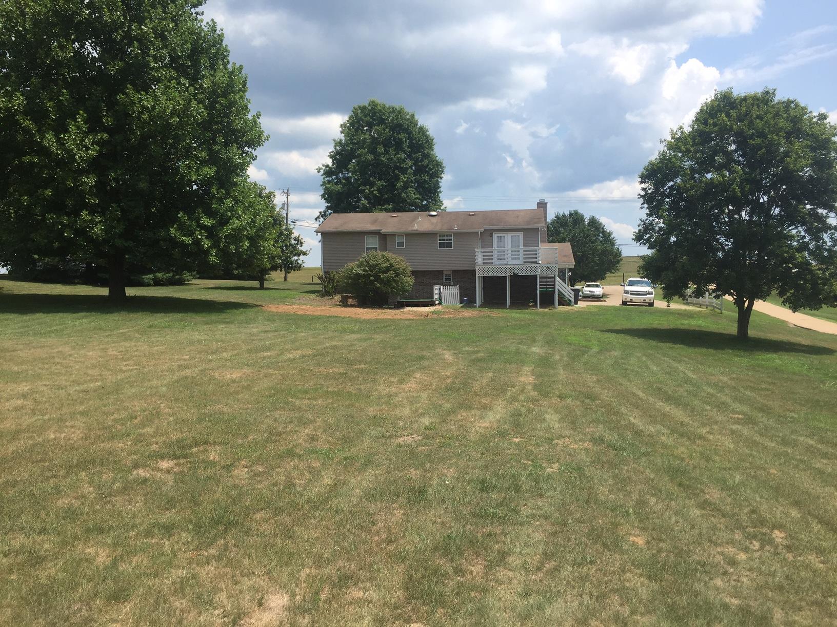 2199 Clara Mathis Road Spring Hill, TN 37174 - Photo 20 of 24 a view of a house with a garden