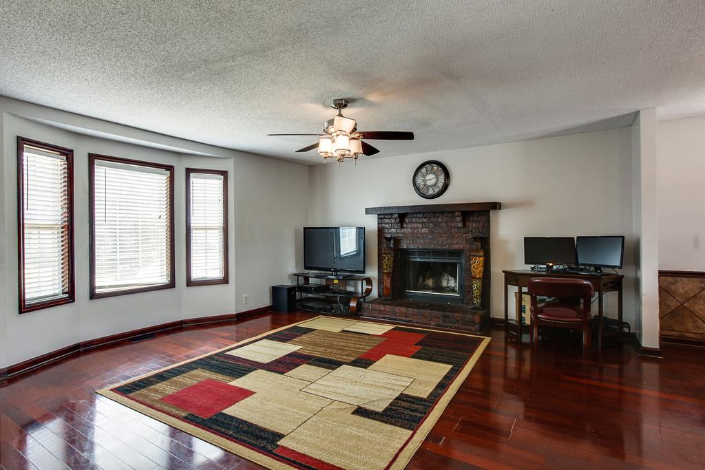 2199 Clara Mathis Road Spring Hill, TN 37174 - Photo 2 of 24 a living room with furniture a fireplace and a table