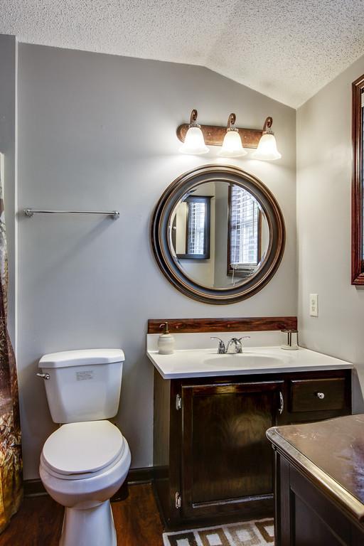 2199 Clara Mathis Road Spring Hill, TN 37174 - Photo 9 of 24 a bathroom with a toilet and a sink