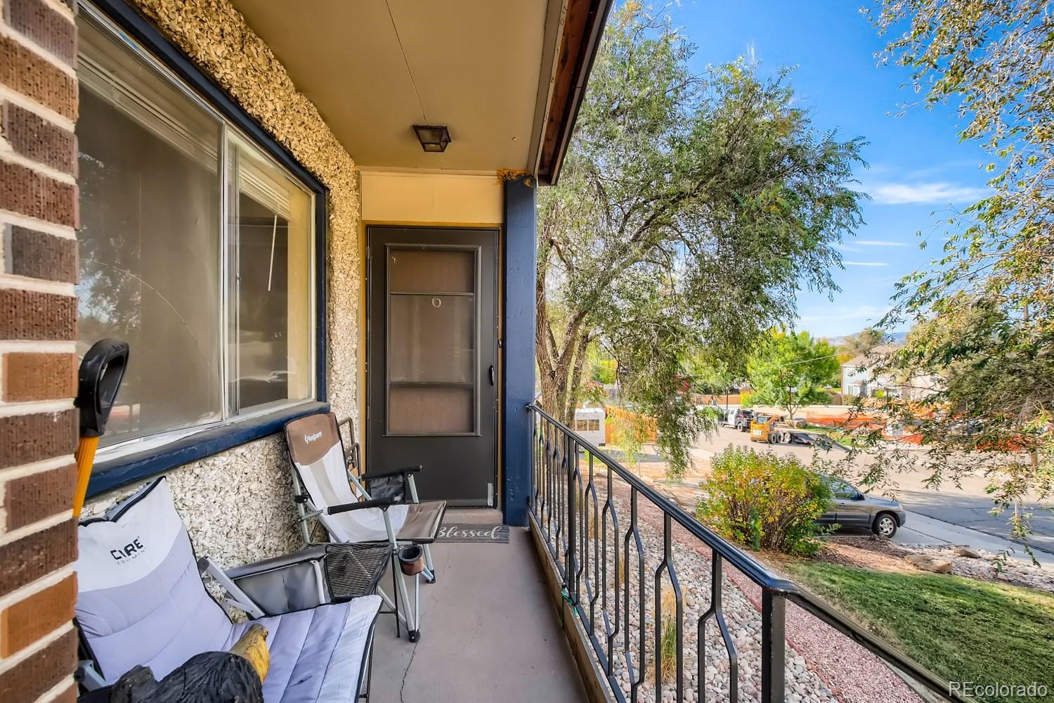 6190 Webster Street Arvada, CO 80003 - Photo 11 of 11 a view of balcony with furniture