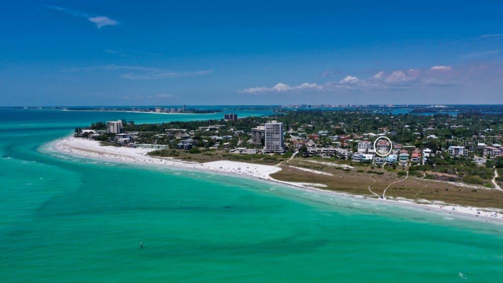309 Beach Road, Unit 309S2 Sarasota, FL 34242 - Photo 1 of 1 a view of a town with residential houses