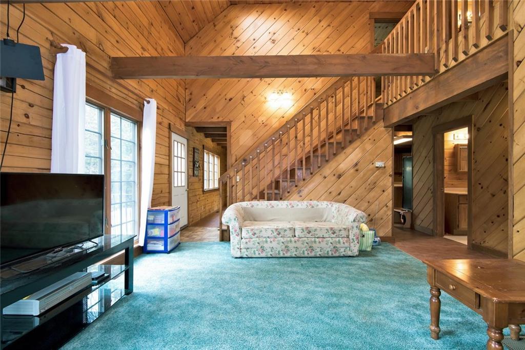 612 Lewiston Road New Gloucester, ME 04260 - Photo 8 of 30 Living room with cathedral ceilings...