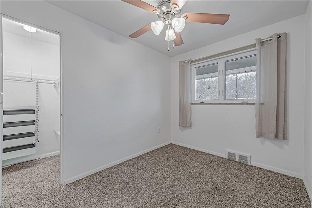 549 Filmore Road Pittsburgh, PA 15221 - Photo 15 of 25 wooden floor in an empty room with a window