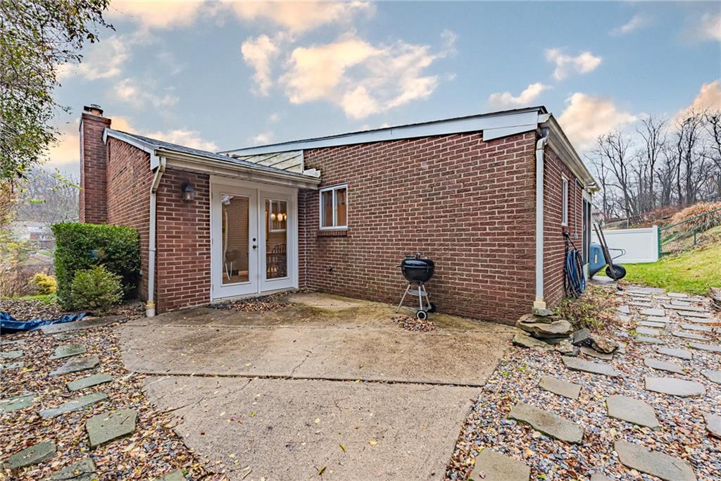 549 Filmore Road Pittsburgh, PA 15221 - Photo 20 of 25 a view of a house with backyard