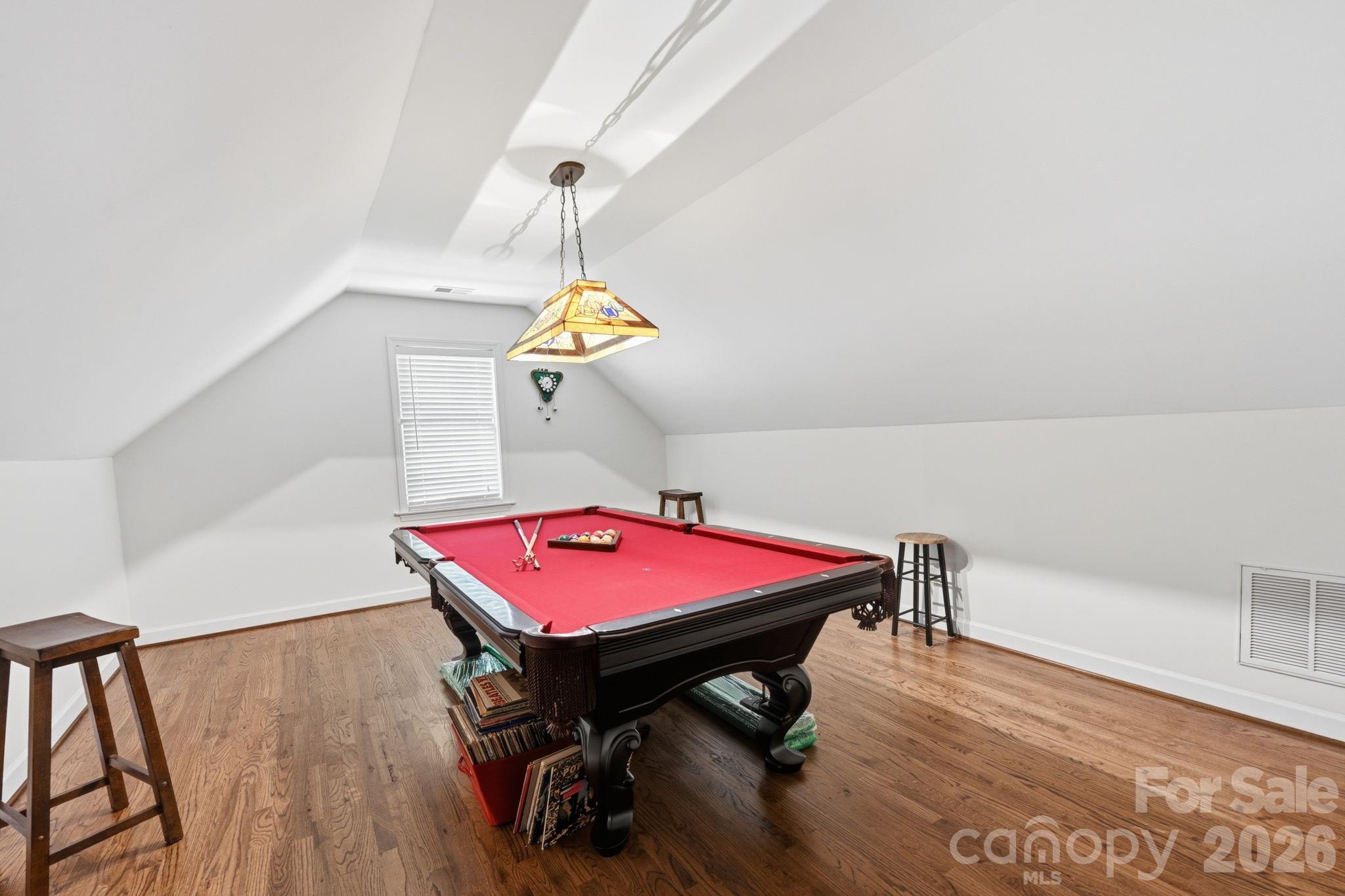 145 Upper Spencer Mountain Road Stanley, NC 28164 - Photo 25 of 29 a room with a table and chairs