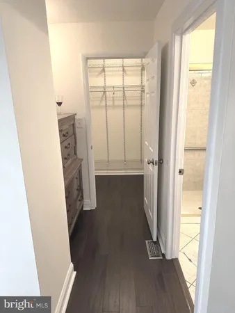 a view of entryway with wooden floor