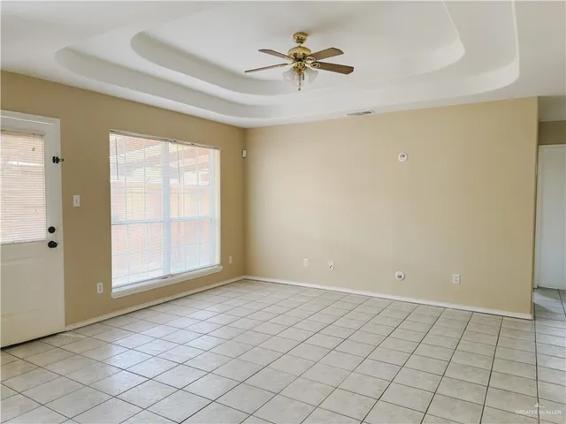 a view of an empty room and window