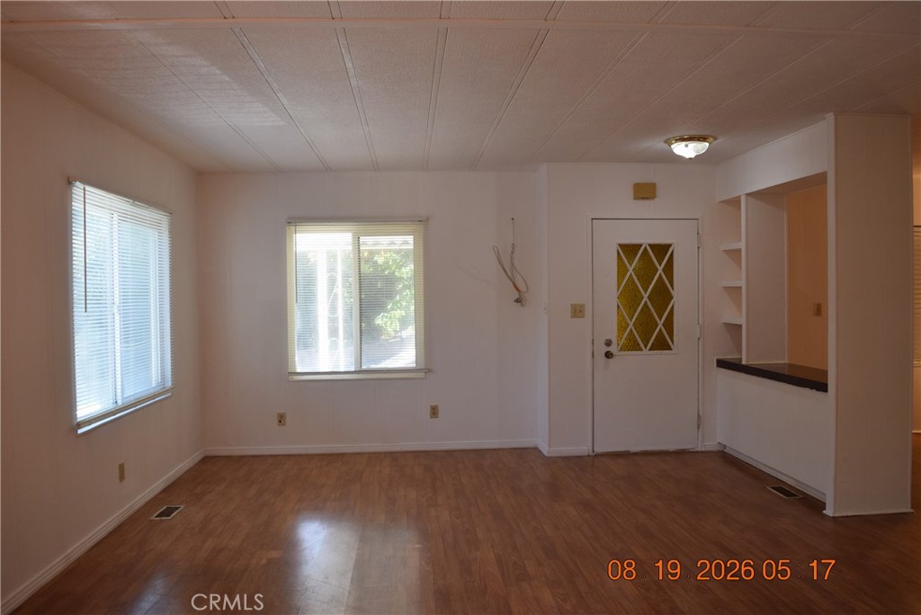 23500 The Old Road, Unit 9 Newhall, CA 91321 - Photo 17 of 56 Open living room view towards second entrance.